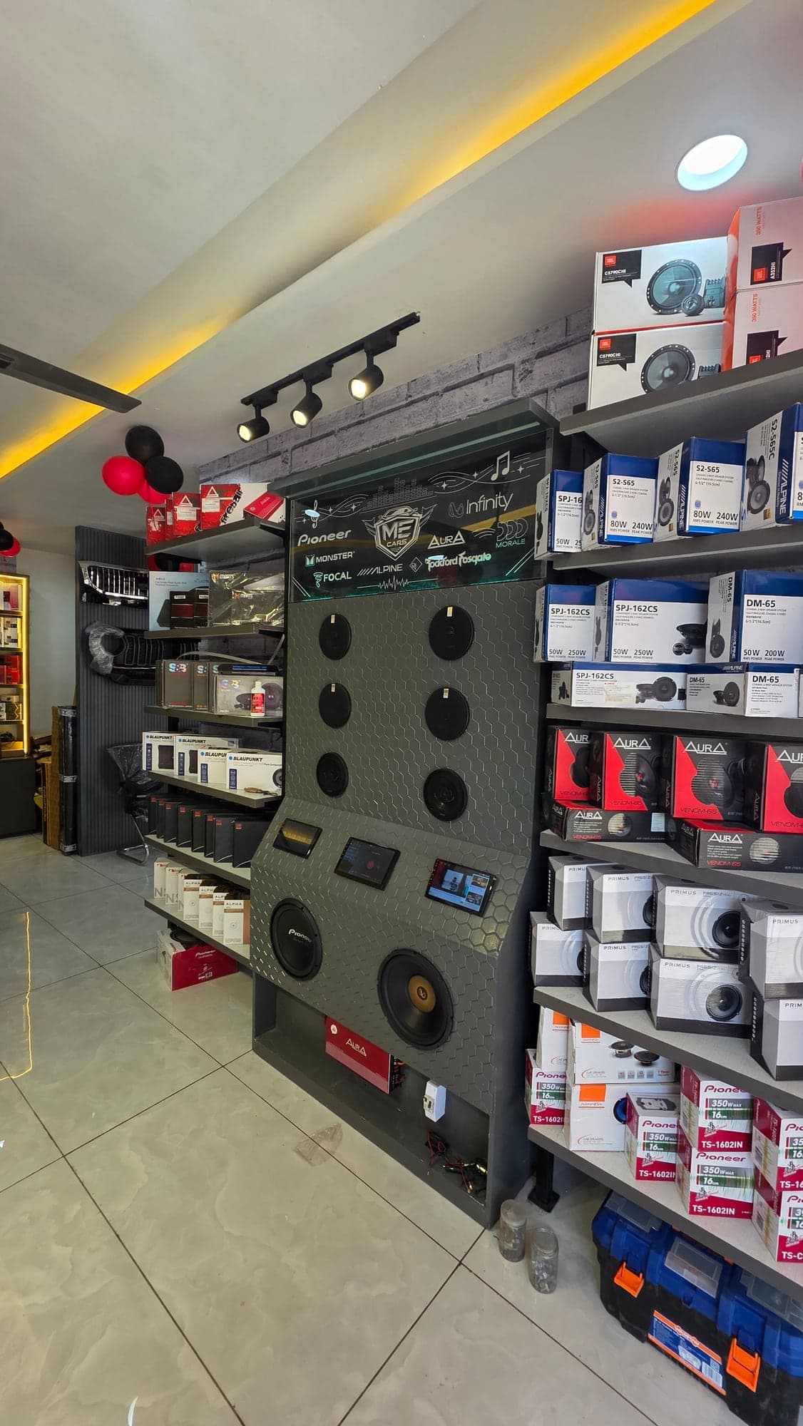 Honeycomb-textured acoustic demo wall for Pioneer, Infinity and Alpine car audio at Malik Electronics, Ludhiana