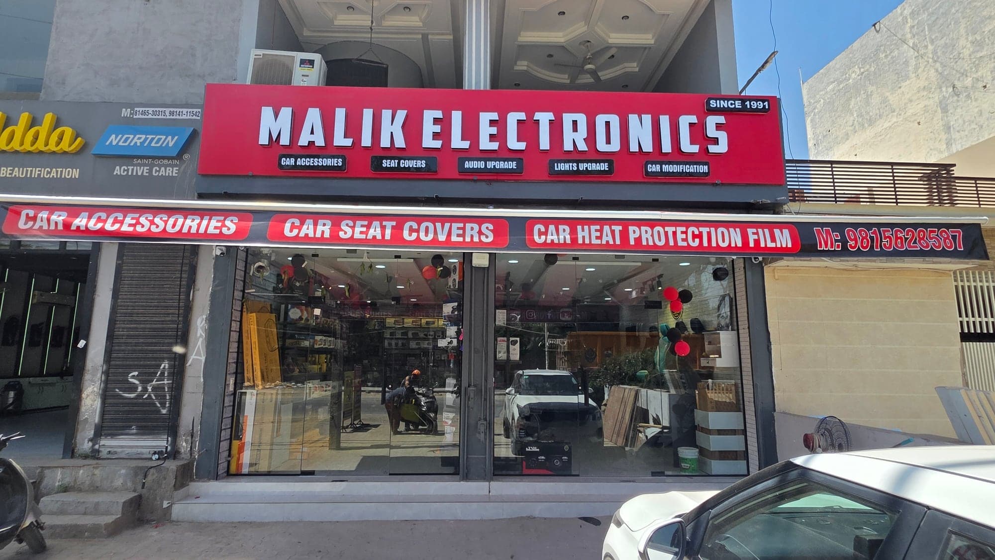 Malik Electronics car accessories storefront in Dugri, Ludhiana