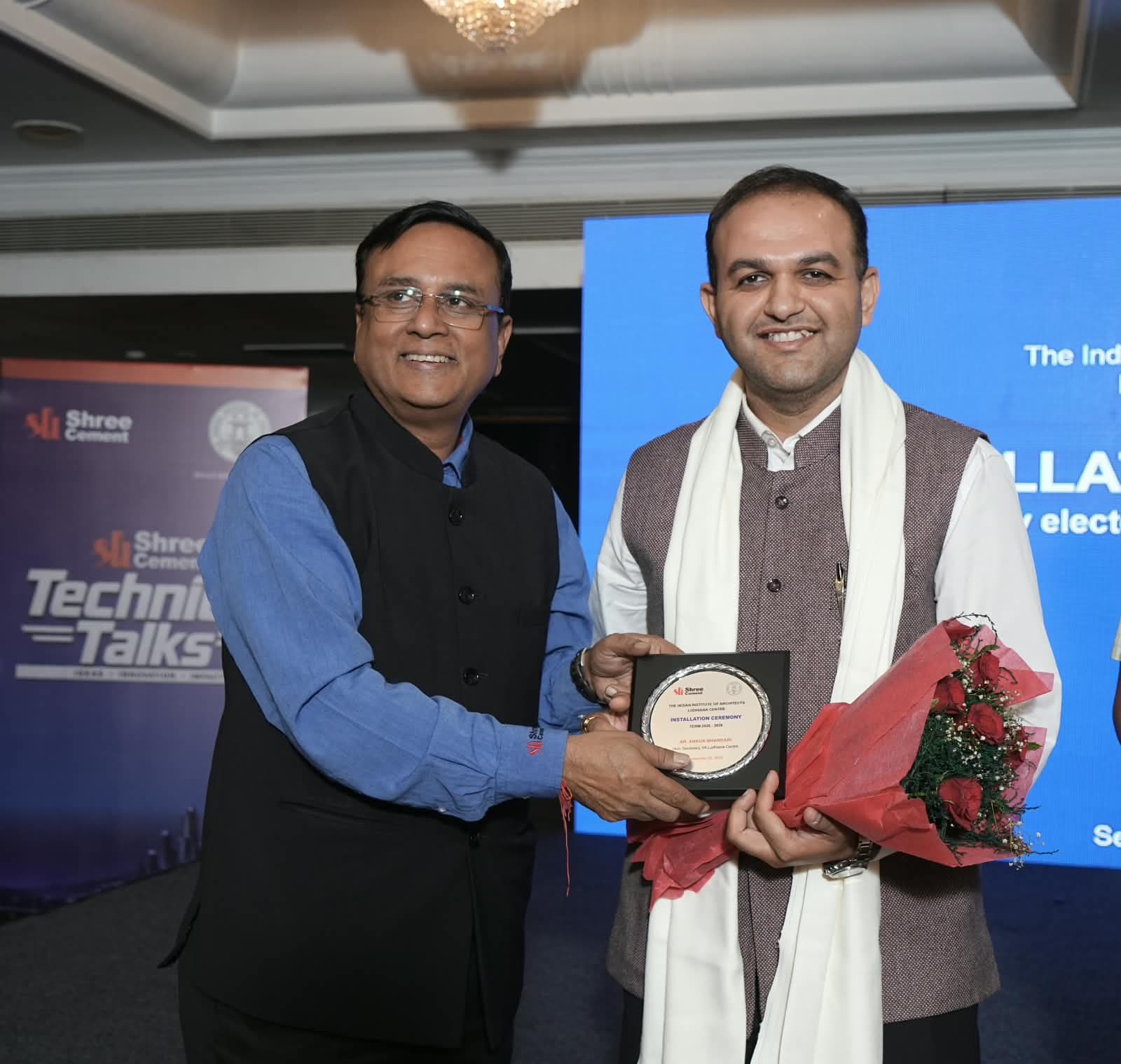 Ar. Ankur Bhandari receiving a commemorative plaque as Hon. Secretary at the IIA Ludhiana Centre installation ceremony, term 2026–2028